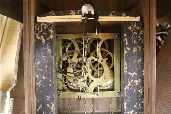 A Black Forest walnut cuckoo clock